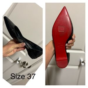 Christian Louboutin black flats